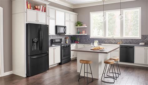 matte black stainless steel appliances with white cabinets|black countertops stainless steel appliances.